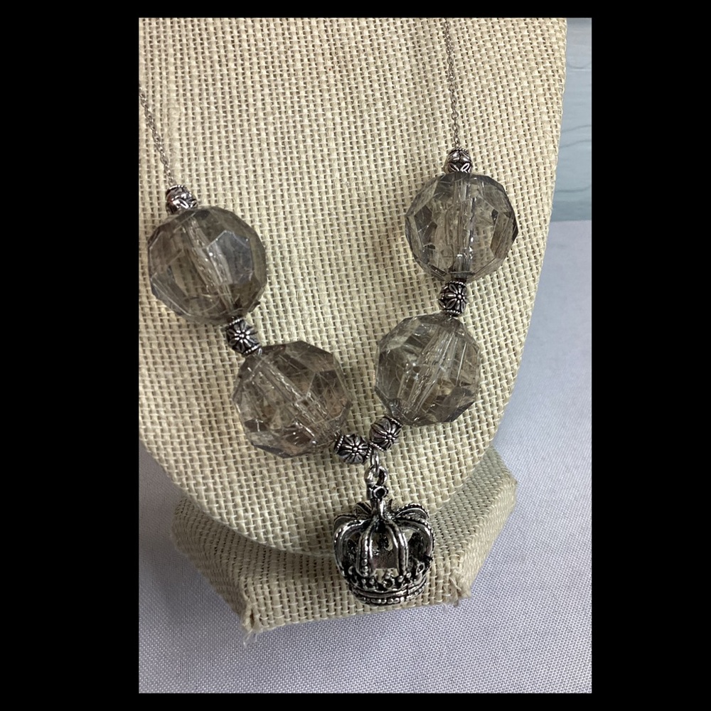 Elegant Silver Beaded Necklace with Crown Pendant